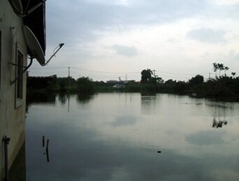 Houses flooded by the crocodile pool
