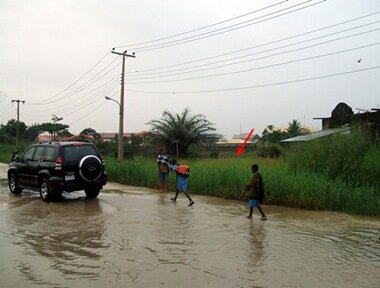 The Estate's central street flooded by the waters of the crocodile pool (red arrow points to the pool)